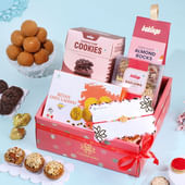 Charming Pink Rakhi With Sweets N Cookies