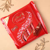 Charming Rakhi Set With Dainty Chocolates