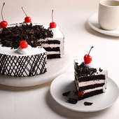 Eggless Black Forest Cake - Side View of Cake With Sliced