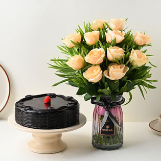 Cherry Topped Chocolate Cake With Peachy Roses