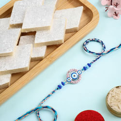 Golden Ganesha Rakhi With Laddoos