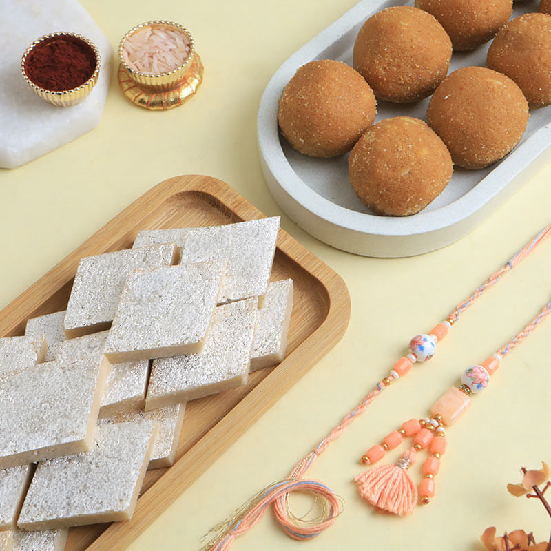 Chic Peach Bhaiya Bhabhi Rakhis With Sweets