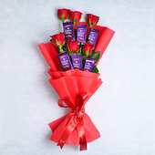 Rose Choco Bouquet:Bunch of 6 Red Roses and 6 Dairy Milk Chocolates