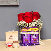 Chocolatey Rosy Posy - Arrangement of 6 Red Roses with 8 Dairy Milk Chocolates with Roli Chawal