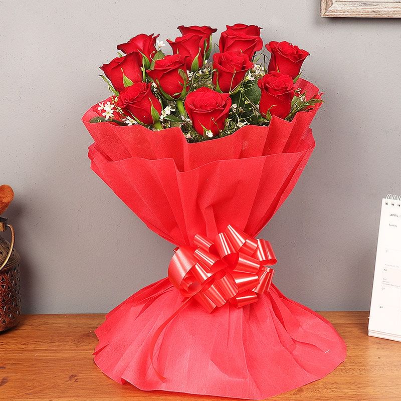 Bunch of Red Roses and Chocolate Cake