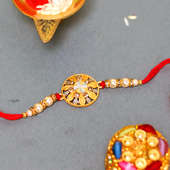 Circular Golden Rakhi - One Diamond Rakhi and Complimentary Roli Chawal