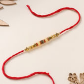 Classic Beads And Pearl Rakhi