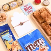 Colourful Floral Rakhi N Gourmet Treats Hamper