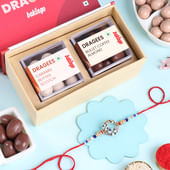 Colourful Floral Rakhi With Sweet Dragees