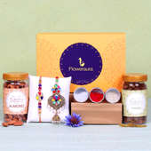 Colourful Lumba Rakhi Signature Box - Set of Bhaiya Bhabhi Designer Rakhi with Roli and Chawal and Raisins and Almonds and One Floweraura Signature Box