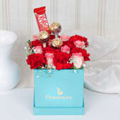 Crimson Red Choco Love: Arrangement of 8 Red Carnations & 8 Pink Roses, 3 Ferrero Rochers and 1 Nestle KitKat Chocolate 