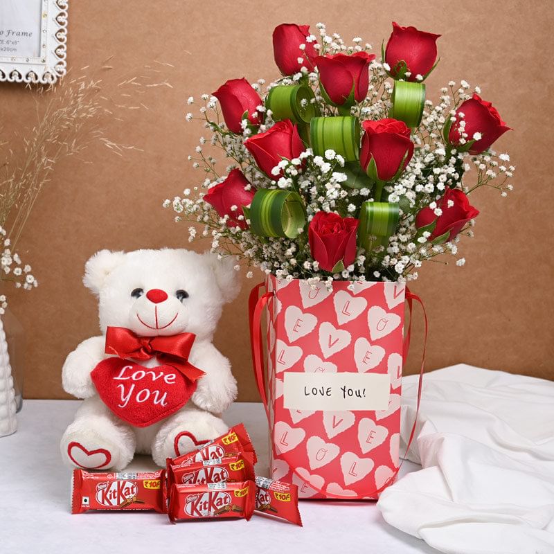 Cuddly Crunchy Rose Combo: 10 Red Roses with 5 KitKat Chocolate