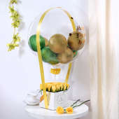 Yellow and green balloons bouquet
