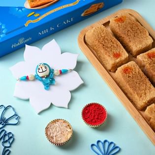 Cute Doraemon Rakhi With Haldirams Milk Cake
