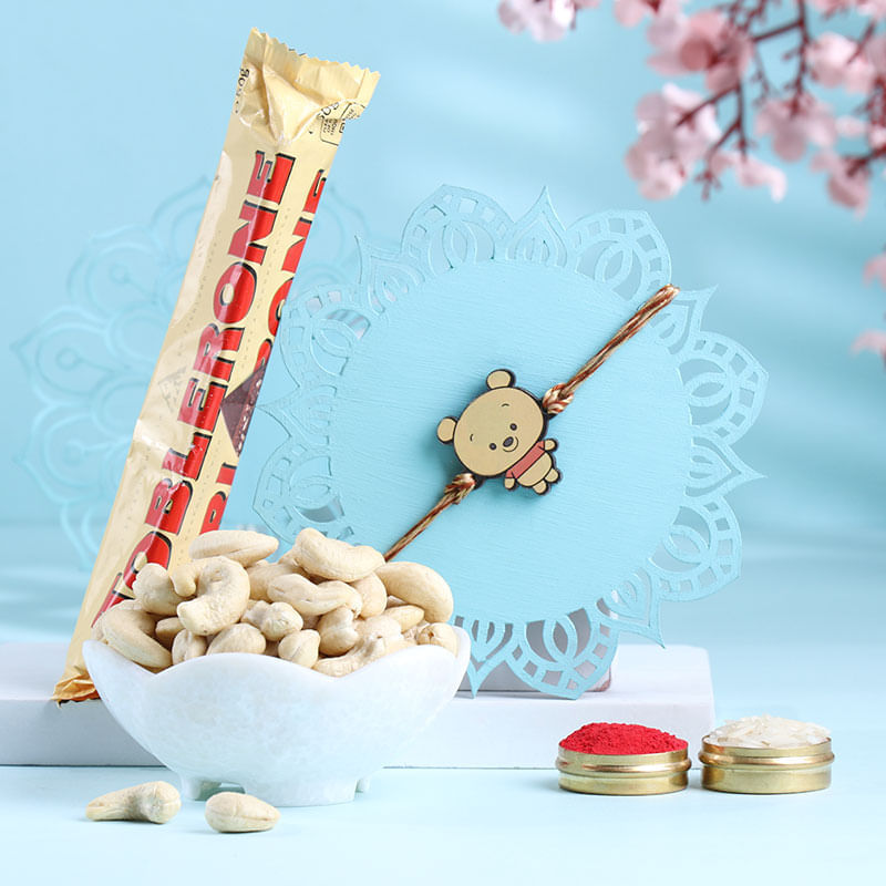 Cute Winnie Pooh Rakhi With Nuts N Chocolates