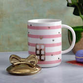 Cutesy Pink Striped Mug With Bow Lid