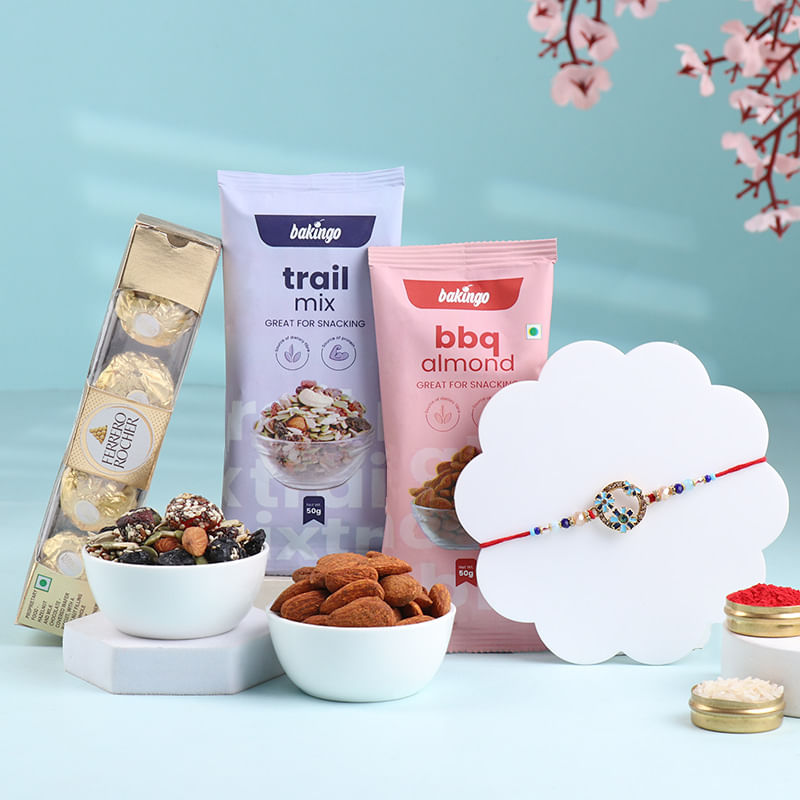 Dainty Floral Rakhi With Festive Treats