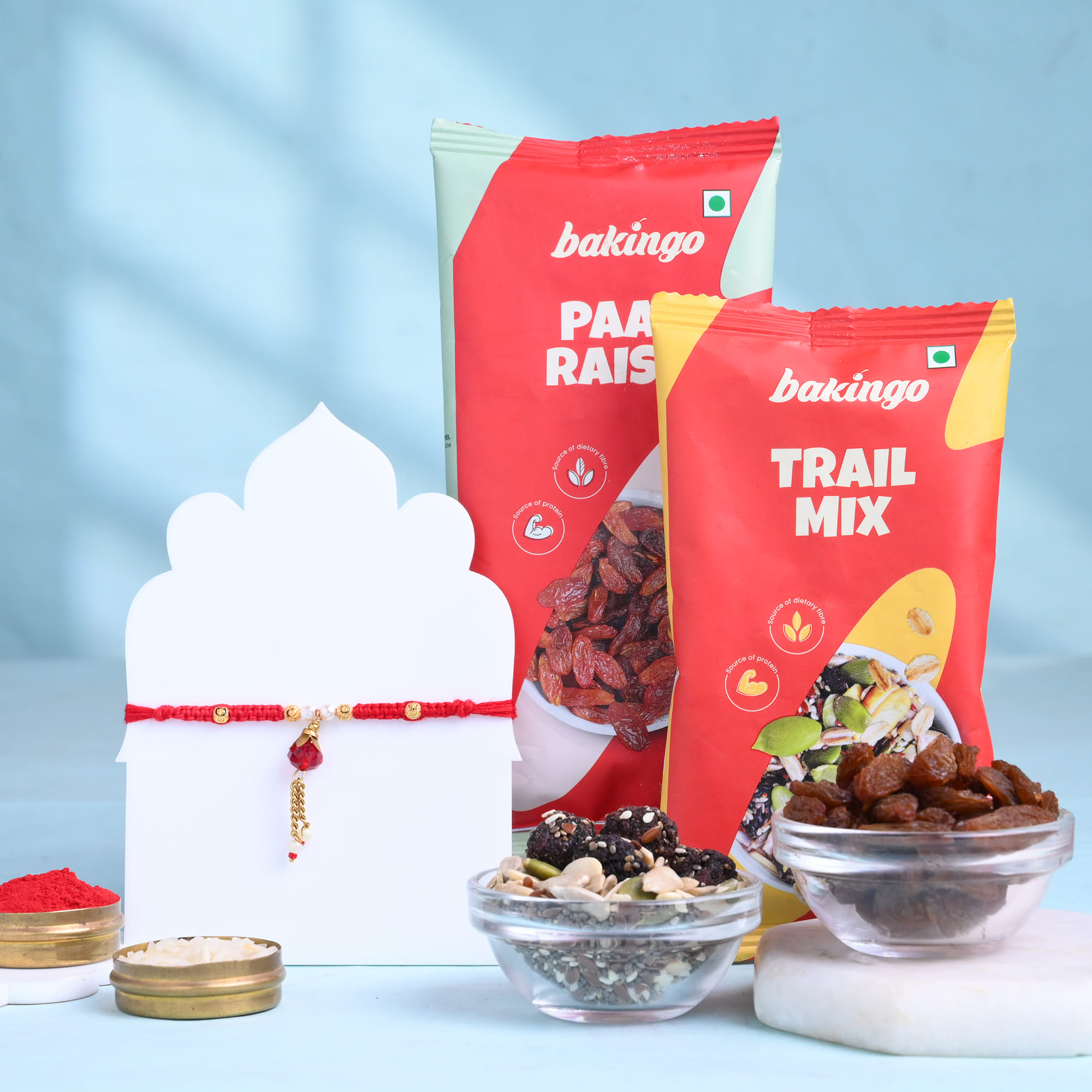 Dangling Ruby Rakhi With Trail Mix N Paan Raisins