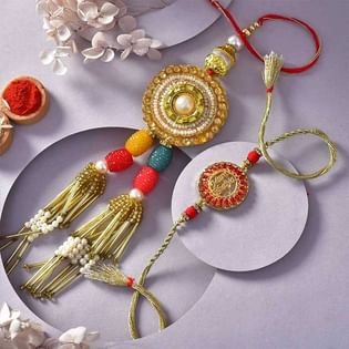 Dazzling Pearl and Stone Rakhi Duo