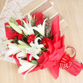 Bunch of Red Carnations and White Lilies