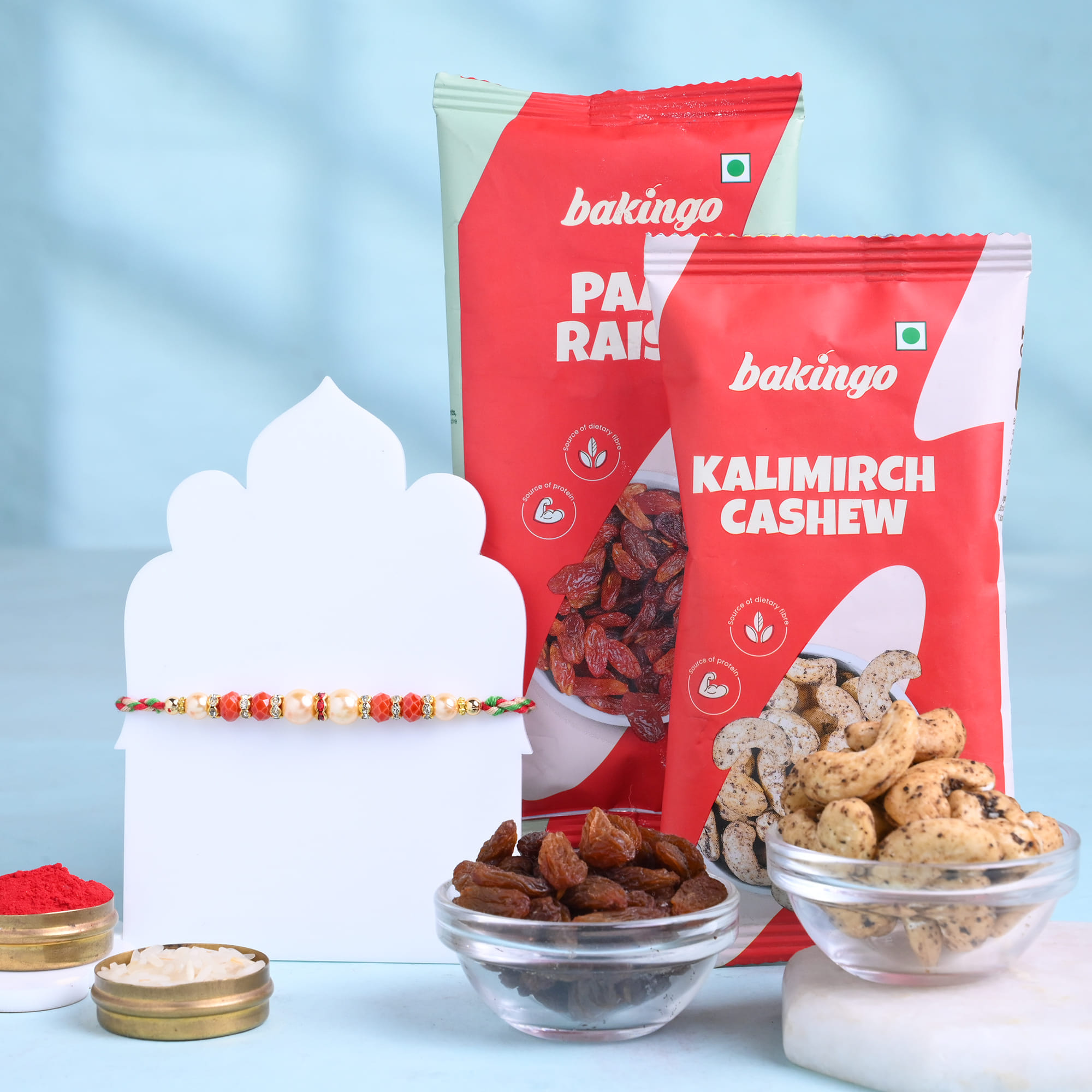Designer Pearl Rakhi With Raisins N Cashews