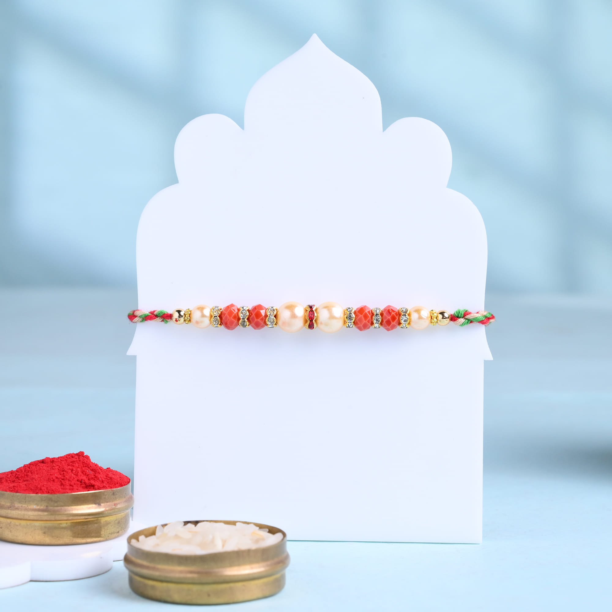 Designer Pearl Rakhi With Raisins N Cashews