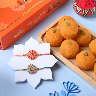 Set of 2 Vibrant Floral Rakhi with Motichoor Laddoo