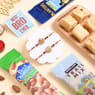 Two Designer Rakhis With Snacks N Soan Papdi
