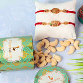 Designer Rakhi Set N Nut Combo - Set of 2 Designer Rakhi with Complimentary Roli and Chawal and 100gm Cashews in Green Floweraura Container