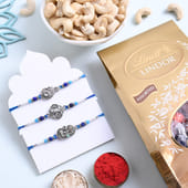 Designer Rakhi Trio With Chocolates And Cashews