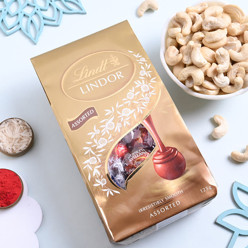 Designer Rakhi Trio With Chocolates And Cashews