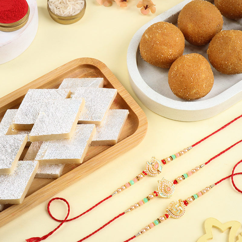 Set Of Three Designer Rakhis With Sweets