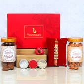 Designer Rakhi With Cookies And Almonds - One Diamond Rakhi with Roli and Chawal and Chocolate Cookies and Almonds and One Floweraura Signature Box