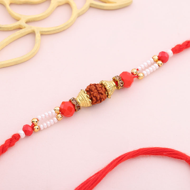 Designer Rudraksh Pearl Rakhi With Red Thread
