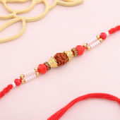 Designer Rudraksh Pearl Rakhi With Red Thread