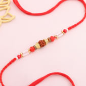 Designer Rudraksh Pearl Rakhi With Red Thread