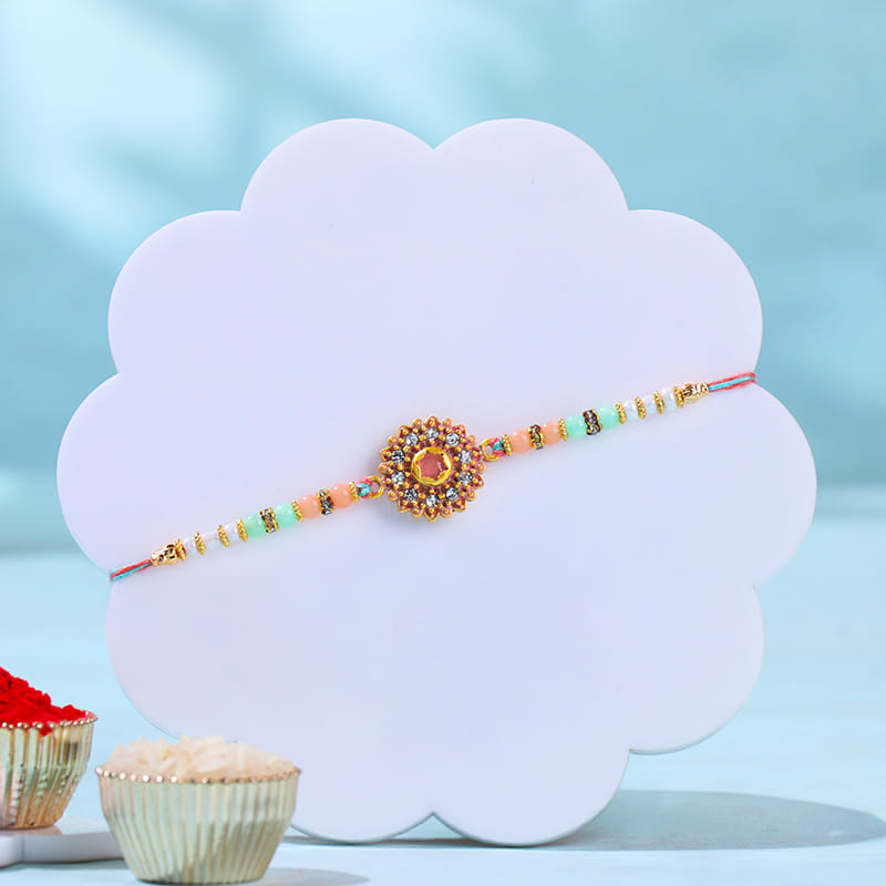 Designer Stone Rakhi With Rasgullas