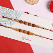 Send Dhoda Sweet With Rudraksh Beads Rakhi - Set of 2 rakhi for Brother
