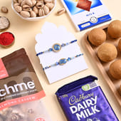 Divine Blue Rakhi Duo With Festive Treats