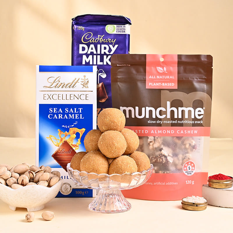 Divine Blue Rakhi Duo With Festive Treats