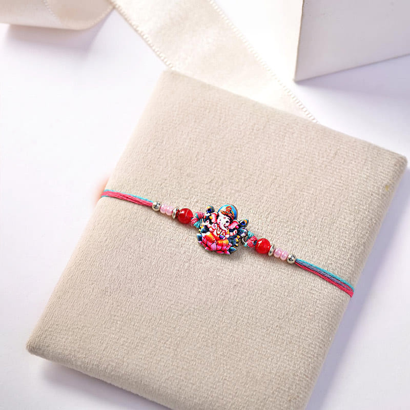 Divine Ganesh Kids Rakhi With Exotic Dark Chocolates