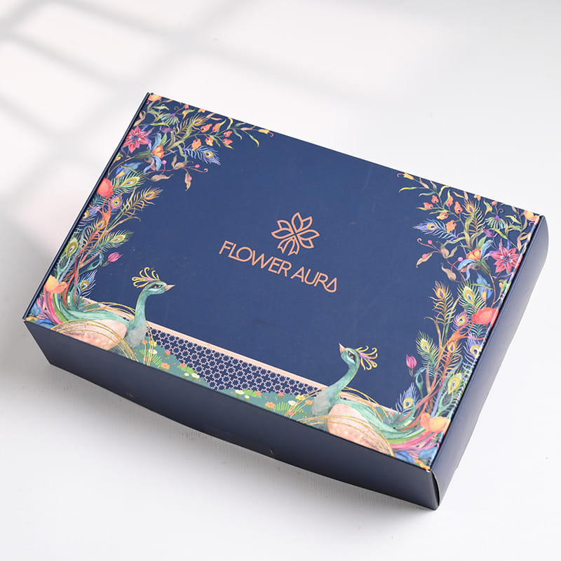 Divine Ganesha N Om Rakhi Gift Hamper with Festive Treats