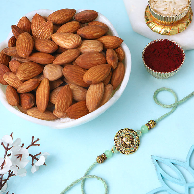 Divine Ganesha Rakhi And Almonds