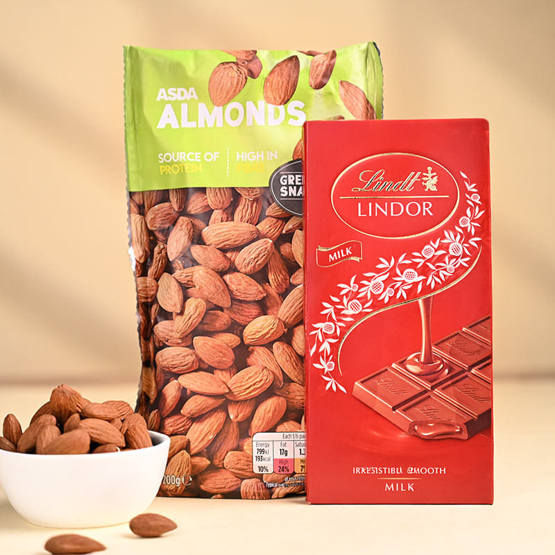 Divine Ganesha Rakhi With Almonds N Chocolate