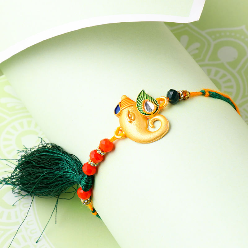 Golden Ganesha Rakhi Online