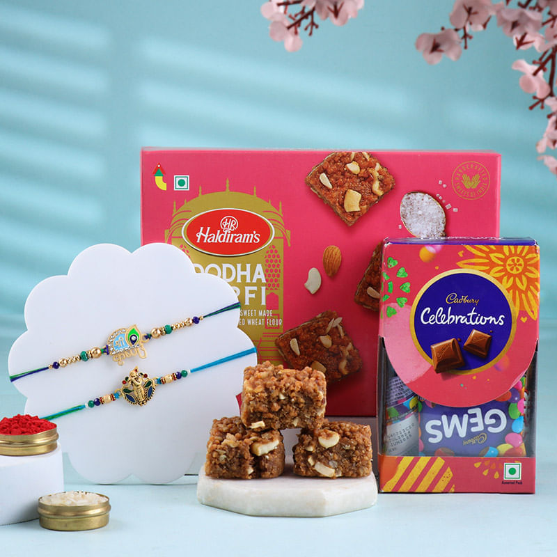 Divine Krishna N Peacock Rakhi With Sweets Hamper