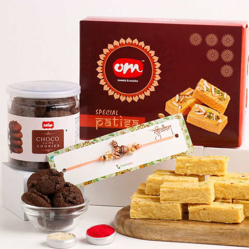 Divine Krishna Rakhi With Cookies N Patisa Mithai (Rakhi with Sweets)