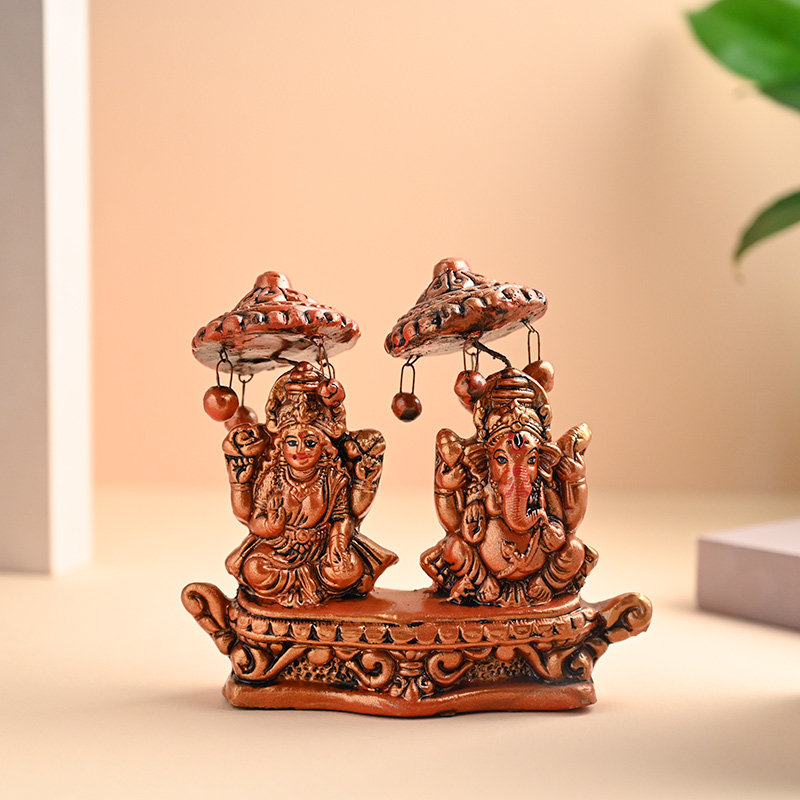 Send Divine Laxmi N Ganesha Idols With Mewa Bites
