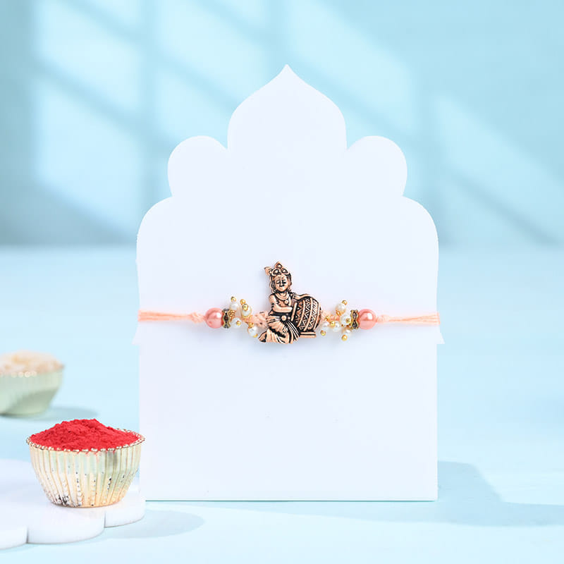 Divine Lord Krishna Rakhi With Besan Ladoos