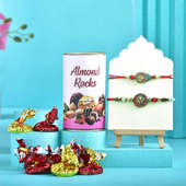 Divine Om Charm Rakhi Duo With Indulgent Treats